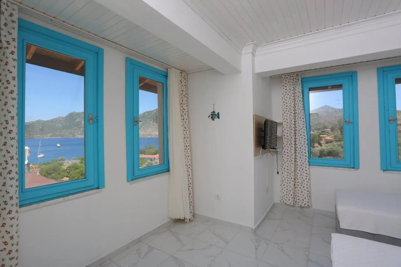 Quarto em Acomodações Particulares Mavi Melek Hotel Selimiye